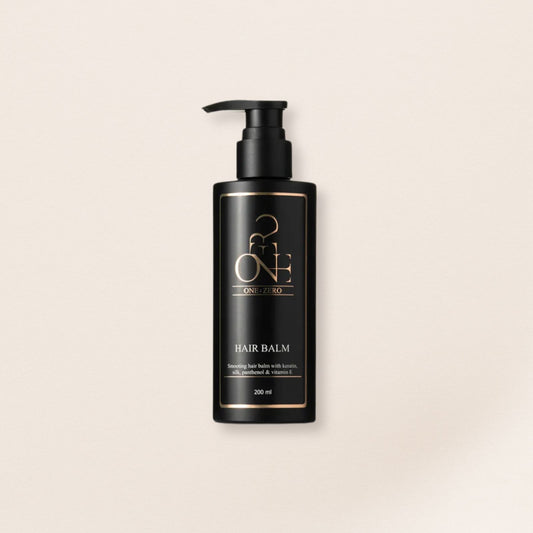 Black hair conditioner bottle for fine hair with pump on a beige background