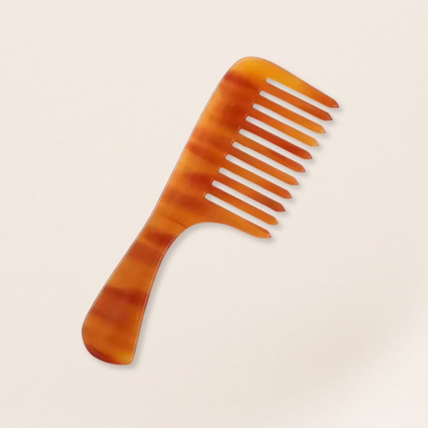 marbled wide-tooth combs for gentle detangling, displayed on a beige background.