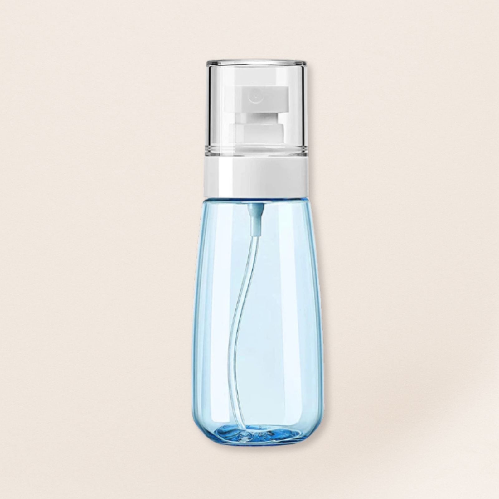 Blue spray bottle with a silver nozzle on a beige background
